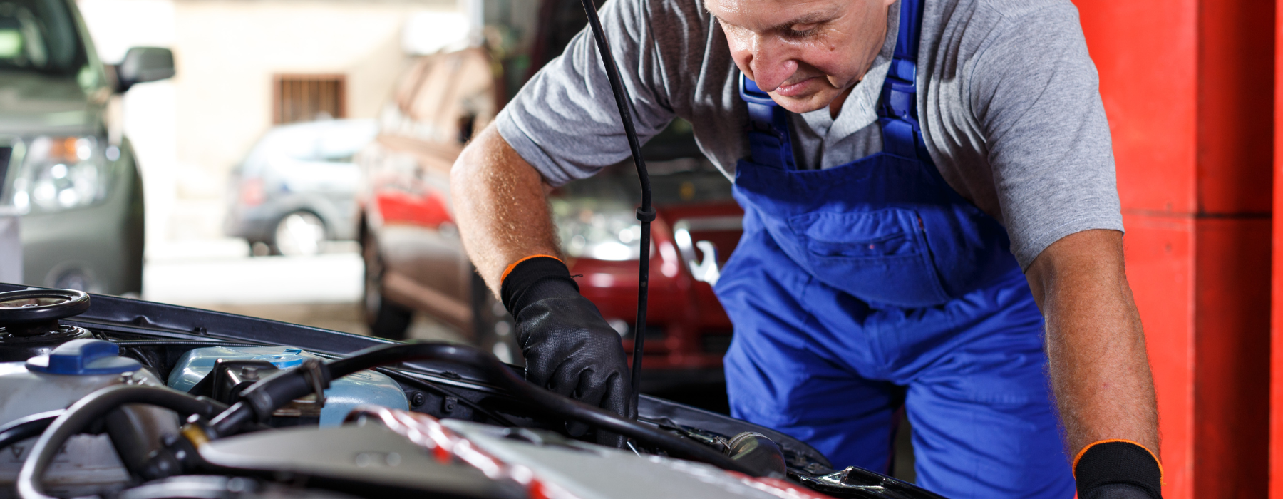 mechanic-fixing-car-engine