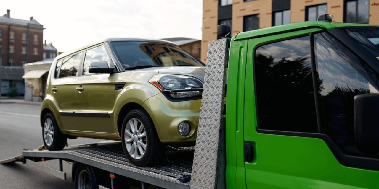 car towing on truck