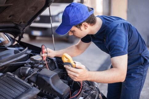 mechanic fixing car