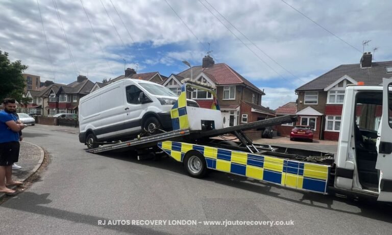 truck towing van in london